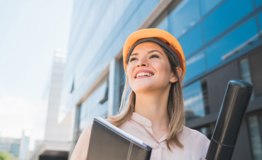 portrait-professional-architect-woman-wearing-yellow-helmet-standing-outdoors-engineer-architect-concept